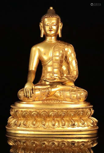 A GILT BRONZE SAKYAMUNI BUDDHA