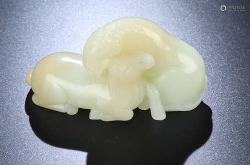 A HETIAN JADE CARVED HORSE SHAPED PENDANT