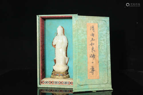 A HETIAN JADE CARVED RULAI BUDDHA