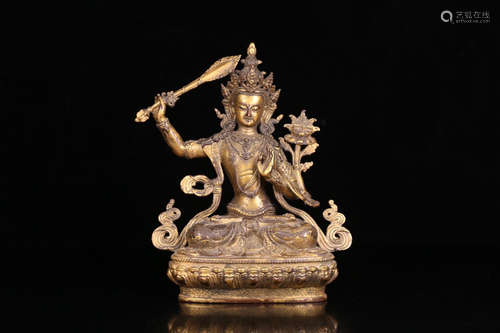 A GILT BRONZE CASTED MANJUSHRI BUDDHA