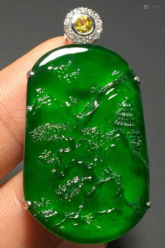 A GREEN JADEITE CARVED LANDSCAPE PENDANT, A CLASS