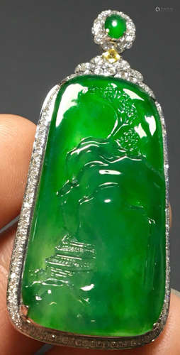 A GREEN JADEITE CARVED LANDSCAPE PENDANT, A CLASS