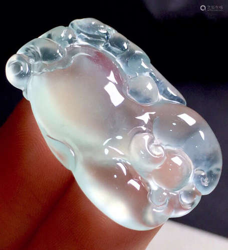 A QINGSHUI JADEITE CARVED CHAYOTE STONE, A CLASS