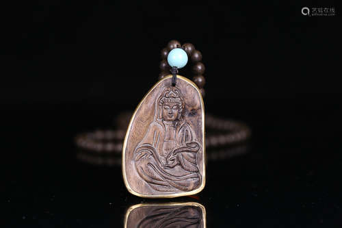 A GUAN YIN PATTERN AGILAWOOD NECKLACE