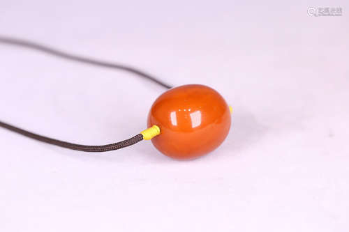 AN OLD BEESWAX BEAD