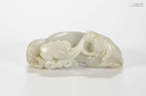 A Chinese Qing Dynasty celadon jade ram group