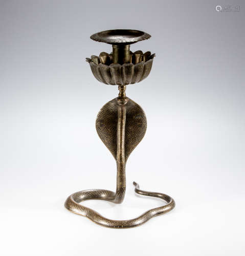 A Persian / India brass and niello snake-form candle holder