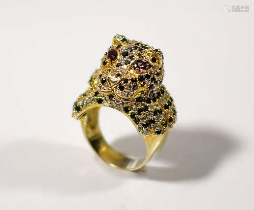 A large high quality gold over sterling designer ring depicts a tiger