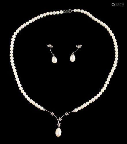 A 14kt white gold jewelry set, pearl and diamond necklace and earrings