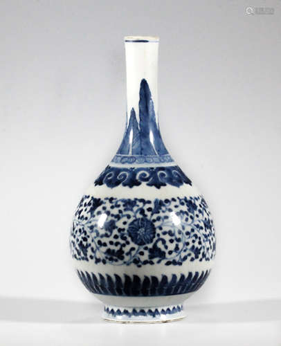 A Ming style blue and white painted vase encircled by a frieze of foliate scroll