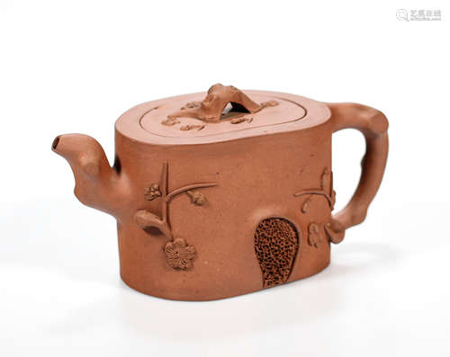 A Chinese Yixing teapot and cover