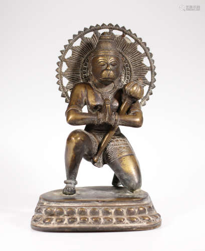 A bronze Hanuman divinity kneeling figure