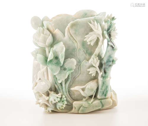 A finely carved Chinese jadeite vase of delicate lotus form