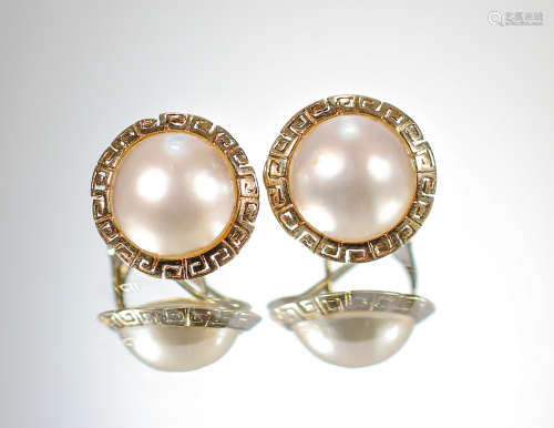 14kt yellow gold earrings with 14mm mabe pearls