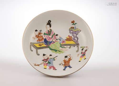 A Chinese famille rose plate decorated with boys at play