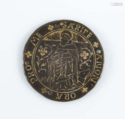 A Renaissance bronze devotional roundel depicting St. Anthony holding a paternoster