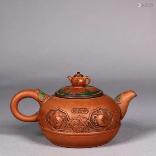 A Chinese Yixing Teapot with Decoration
