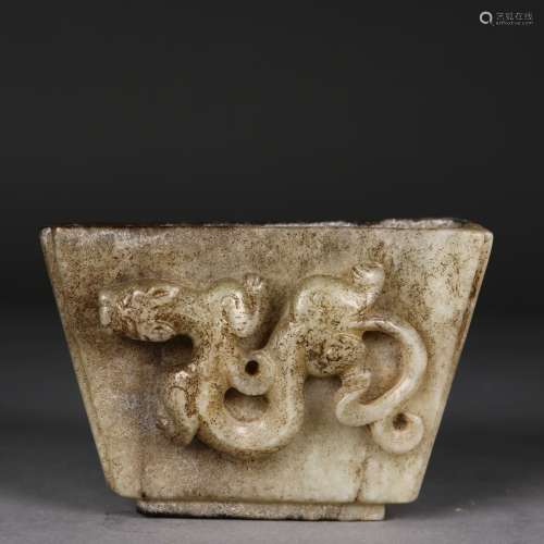 A Chinese Archaistic White Jade Wine Cup