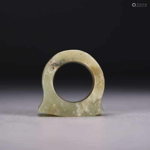 A Chinese Pale-Green Jade Archaic Archer's Ring