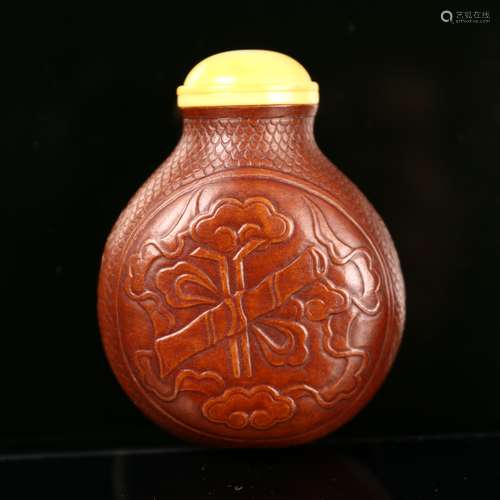 A Chinese Carved Gourd Snuff Bottle