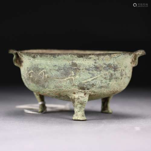 A Chinese Archaic Bronze Tripod Censer, Han Dynasty.