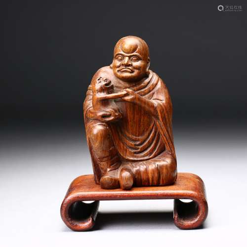 A Chinese Huangyang Wood Carved Figure