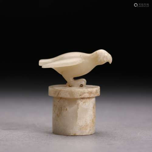 A Chinese Carved White Jade Stand-bird
