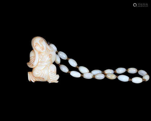 A HETIAN JADE BRACELET WITH DANCING LAYD PENDANT