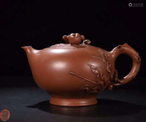 A ZISHA TEAPOT CARVED PEACH TREE WITH MARK