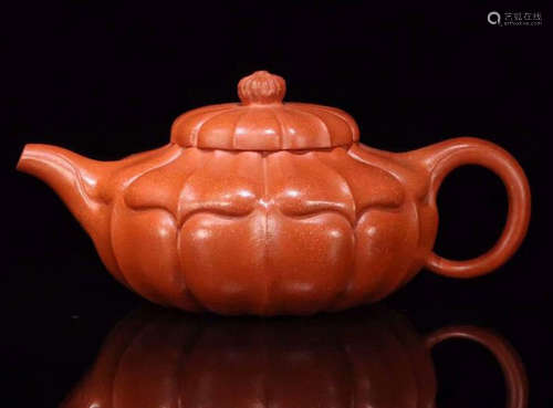 A ZISHA TEAPOT IN BLOSSOM SHAPE