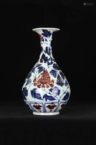 A BLUE & WHITE PORCELAIN VASE IN BLOSSOM DESIGN