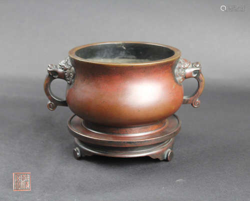 A BRONZE TWIN LION EARS CENSER