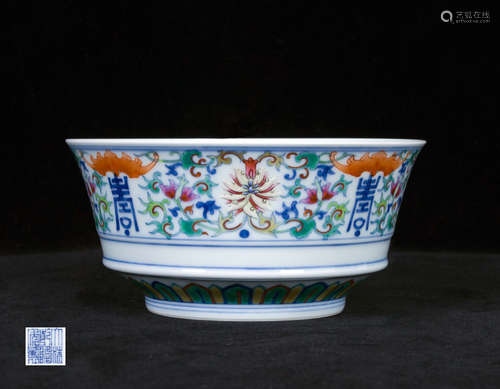 A DOUCAI PORCELAIN IN BLOSSOM DESIGN VASE WITH QIANLONG MARK