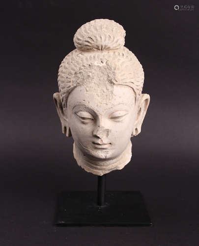 A HEAD OF BUDDHA MADE FROM WHITE MUD (TINY DAMAGED)