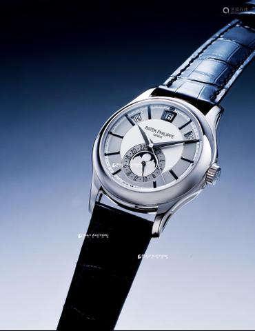 百达翡丽 精美，白金年历自动上链腕表，备24小时及月相显示，型号5205G，年份约2011