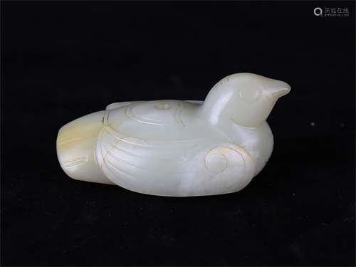 Chinese carved white jade figure of a bird.