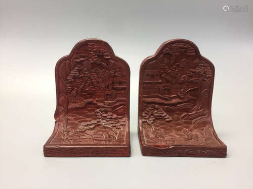 A Pair of Chinese cinnabar bookends.