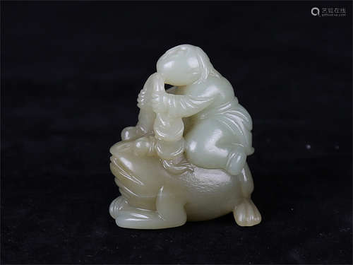 Chinese carved yellow jade figure of an Immortal