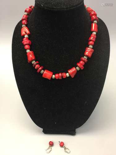 Red coral necklace and earrings.