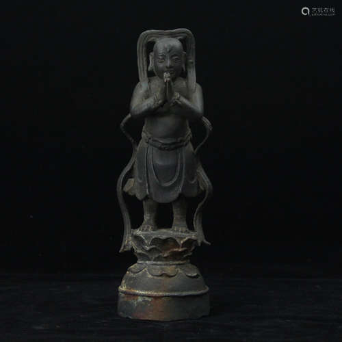 Chinese bronze figure of a boy.