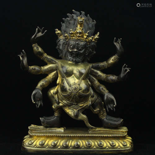 Chinese gilt bronze figure of an Immortal.