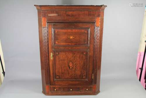 An Antique Oak Corner Cabinet