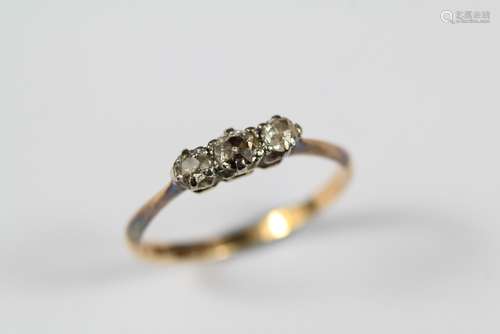 An Antique 18ct and Platinum Three Stone Old-Cut Diamond Ring