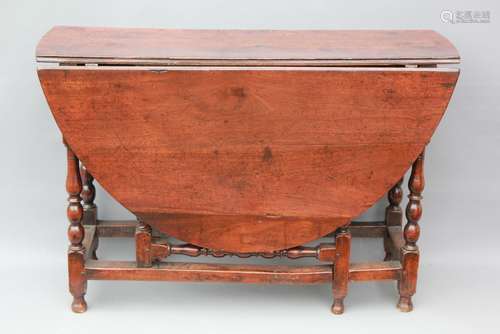 An 18th Century Walnut Gateleg Dining Table