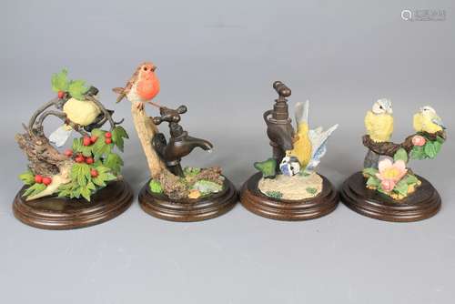 A Collection of Country Artists Bird Figurines