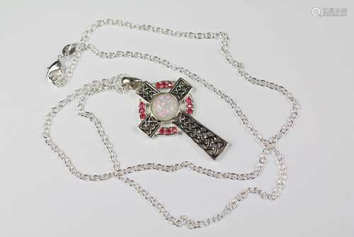 A Sterling Silver Cross Pendant, heightened with a central opal, approx 35 x 22 mm, the fine chain approx 50 cms, approx 6