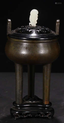 A BRONZE CASTED TRIPOD CENSER