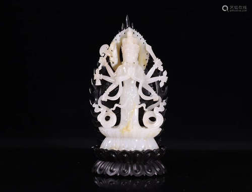 A HETIAN JADE MOLDED MULTI-ARM GUANYIN PENDANT