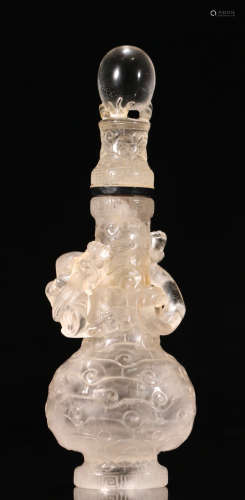 A CRYSTAL CARVED DRAGON SHAPED VASE