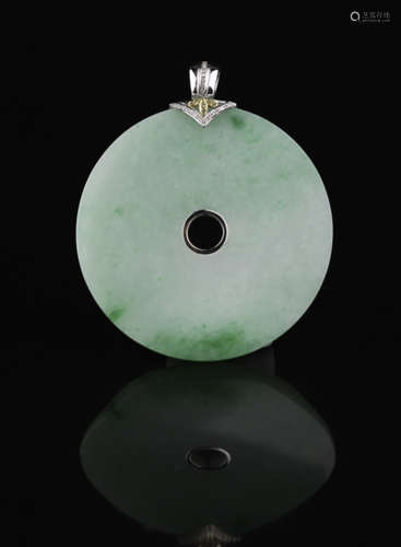 A JADEITE CARVED CIRCLE PING'AN PENDANT